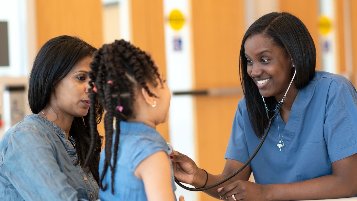 Woman and child seeing doctor