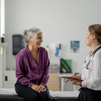 Woman talking to care manager