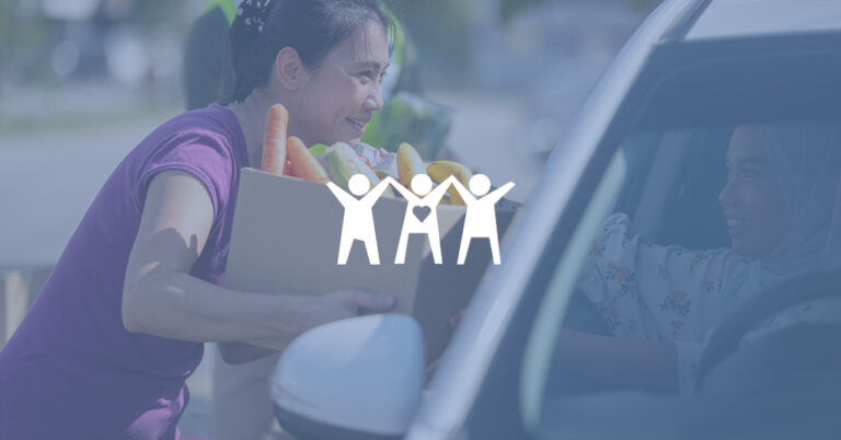Woman giving away food