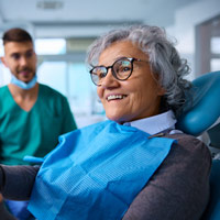 Woman smiling at dentist
