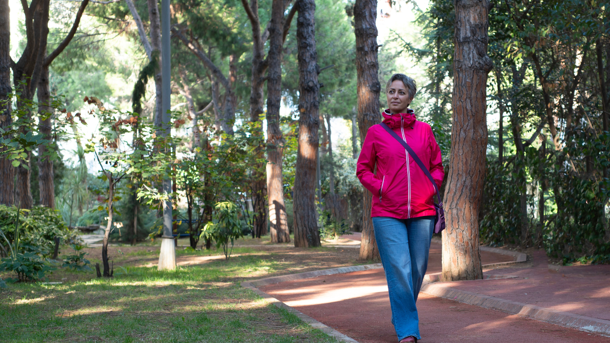 Woman walking through the forest