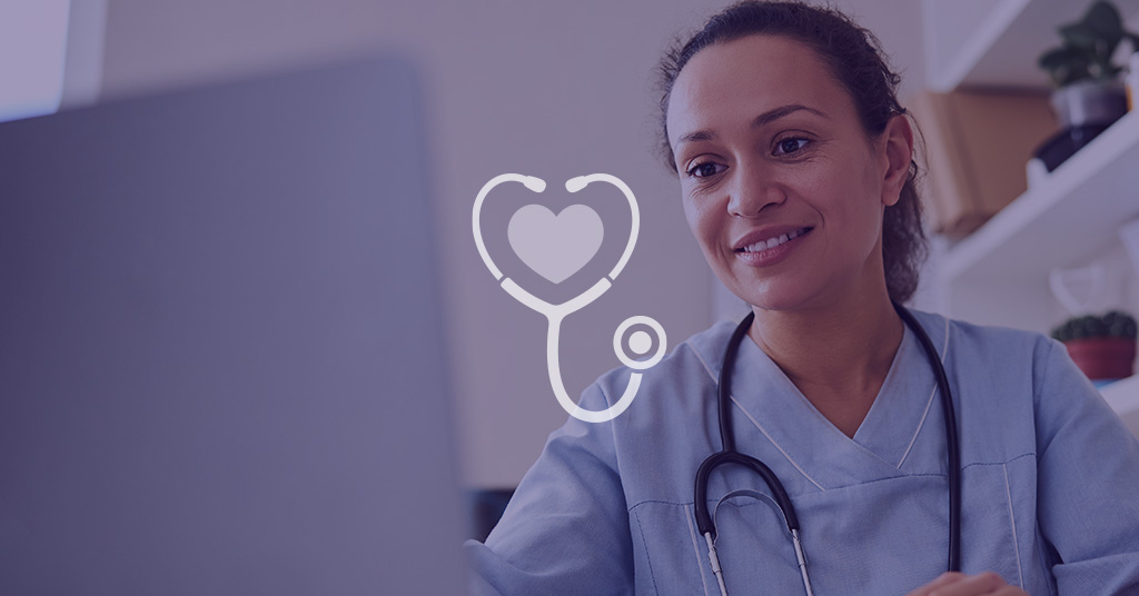 Female provider looking into her open laptop